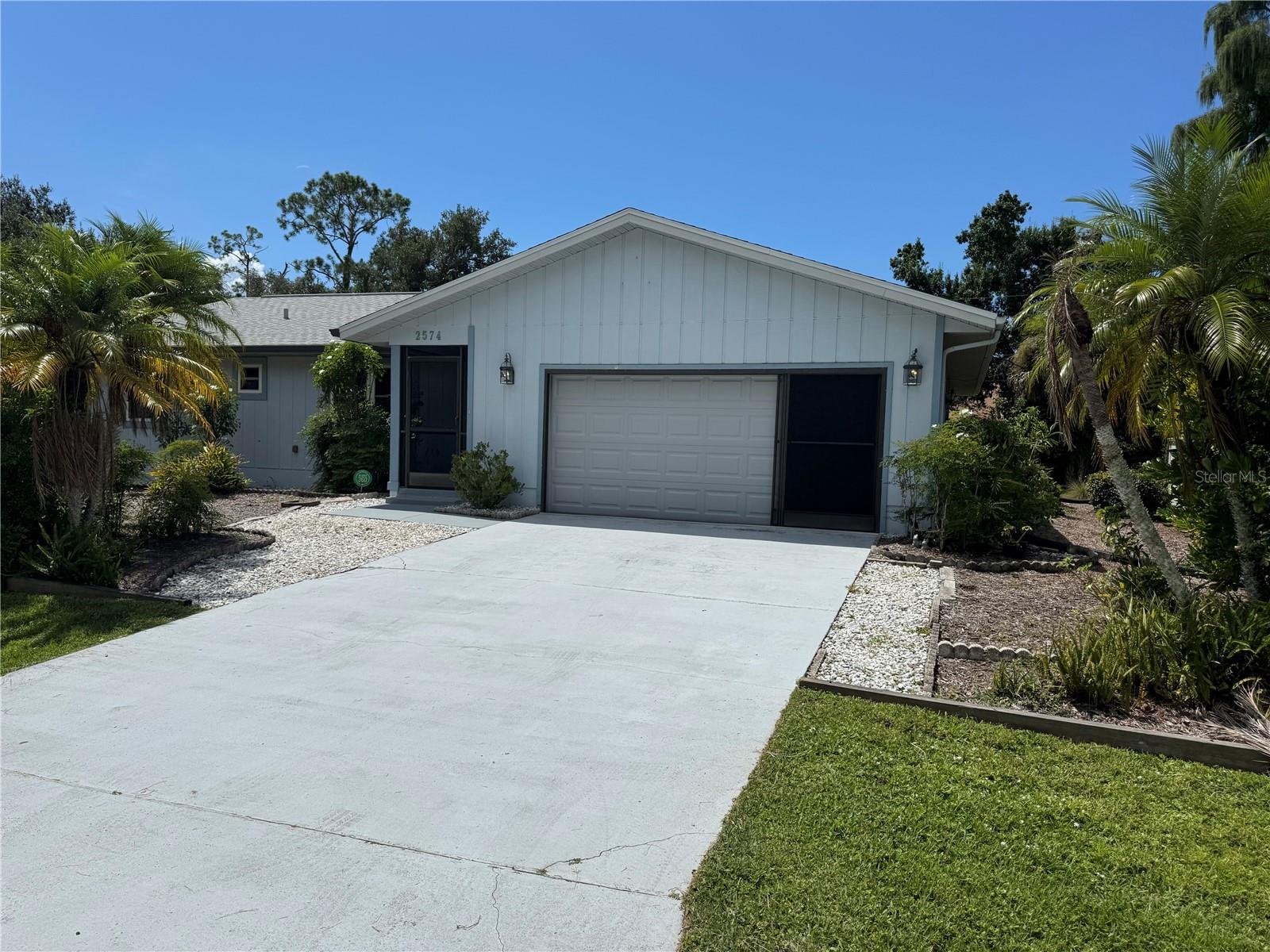 Move-in ready 3 bed, 2 bath home on an oversized double lot in a quiet Port Charlotte neighborhood. Offering great curb appeal, this property features a well-maintained exterior, lush landscaping, and plenty of space for outdoor living or future expansion. Inside, the home offers a functional layout with comfortable living areas and an attached garage. Close to schools, shopping, and local amenities.