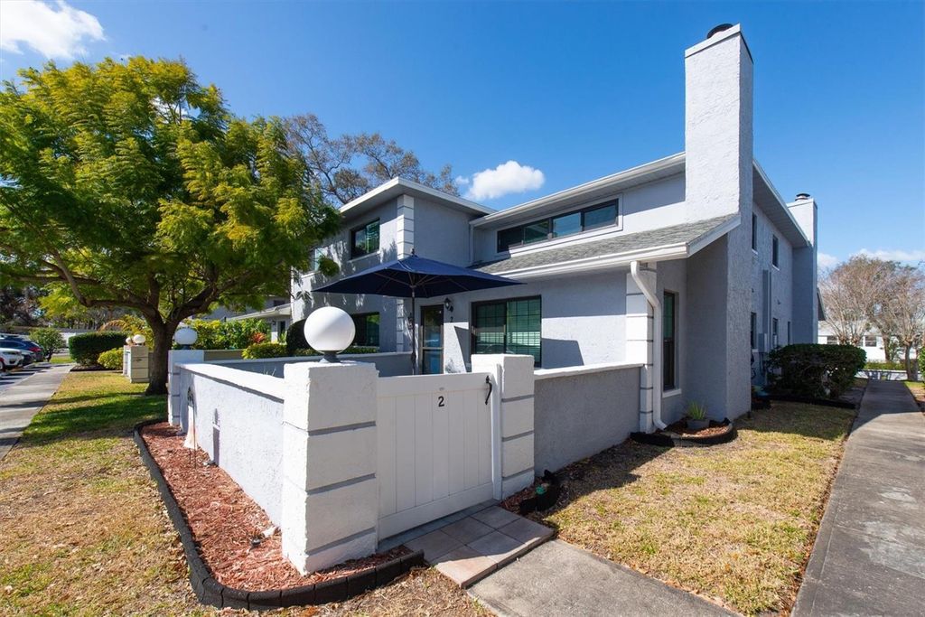 Photo of 5757 Calais Boulevard N #2, St Petersburg, FL 33714 (MLS # TB8477496)