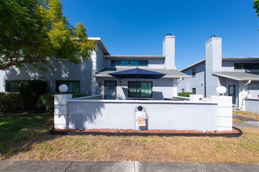 Several photos have been virtually staged.  *Finally — a ground-floor townhome in highly sought-after Calais Village!
Nestled among beautiful tree-lined streets in an unbeatable location, this completely updated home truly has it all. The stunning kitchen features top-of-the-line Woodcraft cabinetry, new high-end appliances, granite counter tops and thoughtful upgrades throughout. Major improvements include a new A/C unit, new water heater, new insulated windows, ceiling fans, light fixtures, carpet — even the 58” Roku TV with sound system conveys!
The ideal layout offers two spacious primary suites, perfect for guests or multi-generational living. Upstairs, a huge loft provides endless possibilities — exercise room, second living area, or home office — plus abundant closet and storage space.
The first-floor living room boasts brand-new carpet and a cozy wood-burning fireplace. The laundry room includes a new, top-of-the-line washer and dryer. Freshly painted and truly move-in ready!
Enjoy biking to Sawgrass Lake Park, a quick drive to vibrant downtown St. Pete, easy access to two major airports, and Florida’s award-winning beaches.

The HOA fee covers:
    •    Water
    •    Trash pickup
    •    Exterior maintenance (paint & roof)
    •    Insurance
    •    High-speed internet & upgraded cable.  
Built with solid concrete block construction, the community also offers a pool, basketball courts, tennis courts, and pickleball courts — all maintained by the HOA.
All the work has been done. Just bring your bags — you’re going to love it here!
All of this and No Flood Insurance required!