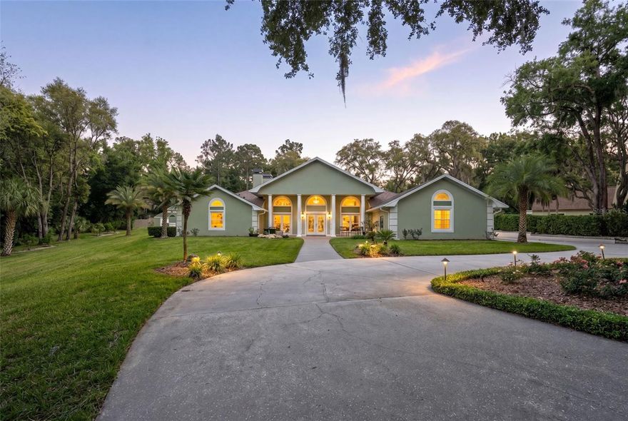 Welcome to 811 Greenshire Ct, a rare opportunity to own a fully renovated private estate in the heart of Longwood, FL, where luxury, space, and multigenerational living come together on nearly 2 acres. Ideally located just minutes from Wekiva Island, Publix at Shoppes of Sweetwater, and top-rated Seminole County schools, this exceptional 5-bedroom, 4-bath residence offers 4,293 square feet of thoughtfully designed living space with no carpet throughout and a true move-in-ready feel. Designed for today’s lifestyle, this home delivers exactly what buyers are searching for—privacy, flexibility, and high-end upgrades—making it ideal for multigenerational living, extended stays, or long-term value. The standout feature is the approximately 800-square-foot attached multigenerational suite built in 2022, offering complete independence with its own full kitchen, living area, spacious bedroom, additional enclosed flex space with Murphy bed, ADA-compliant bathroom, wheelchair-accessible doors, separate septic system, private propane generator, and a dedicated washer and dryer—perfect for in-laws, guests, or private living quarters. Inside the main home, refinished travertine floors and new wood flooring in every bedroom create a seamless blend of elegance and warmth, complemented by an updated kitchen with refinished cabinetry and newer appliances, a luxurious primary suite with a spa-inspired bath and Roman tub, and a beautifully remodeled guest bath featuring a custom stained-glass window, new tile shower, and updated cabinetry. Hunter Douglas Roman shades are installed throughout, and all windows and doors were replaced between 2021 and 2022, adding both efficiency and peace of mind. The outdoor living experience is equally impressive, featuring a saltwater pool with a variable speed pump and computer-controlled lighting, an enclosed courtyard for added privacy, and an expansive fenced backyard with an additional cleared half-acre—ideal for entertaining, future expansion, or simply enjoying the space. A whole-home audio system extends to the pool, deck, and porch, creating a seamless indoor-outdoor lifestyle. Additional highlights include a heated and air-conditioned garage with epoxy flooring, smart sprinkler system, newer roof, dual-zone HVAC, and a full alarm system. Homes offering this level of land, upgrades, and true multigenerational flexibility in Longwood are rare, making this a standout opportunity for buyers seeking space, luxury, and long-term value. Schedule your private showing today.