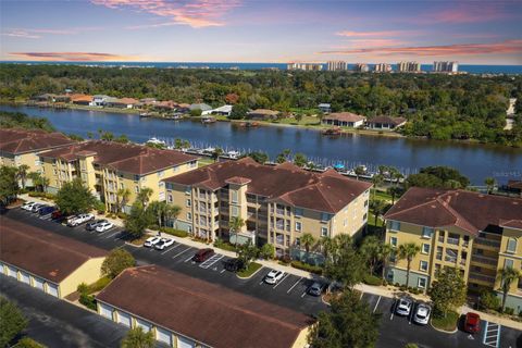 Photo of 600 Canopy Walk Lane #613, Palm Coast, FL 32137 (MLS # FC313929)