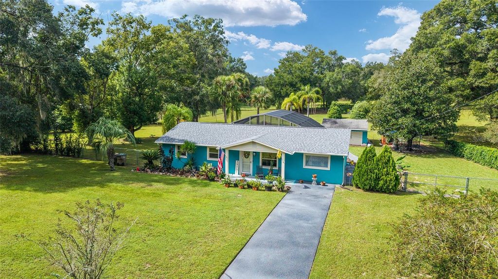 Photo of 39337 N Meyers Road, Lady Lake, FL 32159 (MLS # OM711084)