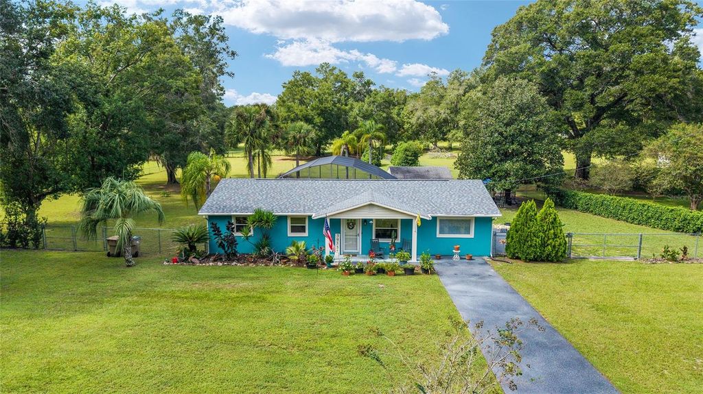 Photo of 39337 N Meyers Road, Lady Lake, FL 32159 (MLS # OM711084)