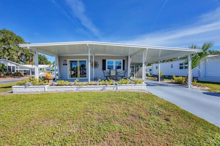 Welcome to 131 Oakwood Lane, a well-maintained and move-in-ready 2BR/2BA home offering comfort, functionality, and an excellent Sarasota location. This spacious residence features a desirable split-bedroom floor plan that provides added privacy, with the primary suite offering an en-suite bath, generous closet space, and easy access to the main living areas. The open living and dining room is filled with natural light, creating an inviting environment that transitions seamlessly into the functional kitchen. With ample cabinetry, efficient layout, and convenient access to the dining area, the kitchen is designed for both everyday use and ease of entertaining. Interior laundry, multiple storage options, and a practical floor plan enhance the home’s overall convenience. Exterior highlights include a private driveway, covered carport, low-maintenance landscaping, and mature trees that add shade and charm to the neighborhood. The newly updated lanai and screen room (11/24) expand your outdoor living options and provide a comfortable place to relax year-round. Located in a peaceful and friendly community, this home offers walkable streets and a quiet atmosphere while still being close to everything Sarasota has to offer.
Just minutes from University Town Center, grocery stores, restaurants, medical providers, and popular retail destinations, the location provides quick access to I-75 and downtown Sarasota. For beach lovers, Lido Beach and Siesta Key are only a short drive away, offering some of Florida’s most beautiful coastline. Significant recent improvements add exceptional value and peace of mind, including a new roof (11/24), new lanai and screen room (11/24), new A/C evaporator coil (10/25), new vapor barrier and ducts (09/22), and new hurricane-impact windows (03/25). This home is ideal for seasonal living, full-time residency, or anyone seeking an affordable and well-cared-for property in a prime Sarasota setting. Schedule your showing today.