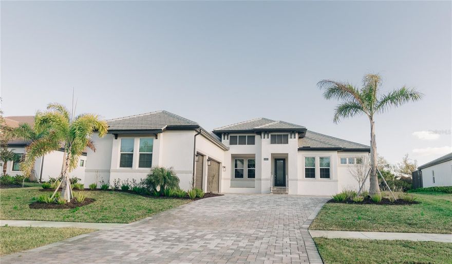 Where Modern Design Meets Coastal Luxury - Designed for both refined comfort and seamless indoor-outdoor living, this extensively upgraded MI Homes residence delivers a private retreat just minutes from the Gulf, blending modern elegance with the relaxed sophistication of Florida’s coastal lifestyle.

Located within the sought-after Cassata Lakes community, this newer construction home showcases exceptional craftsmanship and extensive custom enhancements throughout. The spacious floor plan offers 3 bedrooms, 3 full bathrooms, a private den, and a versatile bonus room with — ideal for a home office, media room, or additional flex space. A 3-car garage and expanded paver driveway add both functionality and elevated curb appeal.

Inside, thoughtful design meets smart innovation, featuring integrated surround sound indoors and out, smart home lighting throughout, Lutron automated shades in the primary suite, a custom built-in bar feature wall, and a fully ventilated attic with blown in insulation for enhanced efficiency. The primary suite is complemented by a custom-designed closet with built-ins and an integrated laundry hamper for refined organization.

Outdoor living is equally impressive. A professionally designed 2025 pool and spa with water and light features anchors the backyard retreat, accompanied by a fully equipped outdoor kitchen and a large fenced yard—creating an ideal setting for entertaining or quiet relaxation.

Conveniently positioned just minutes from Nokomis Beach, Sarasota Memorial Hospital Venice, Laurel Nokomis School, and everyday shopping and dining, this home offers a rare blend of luxury finishes, modern technology, and prime location.

Experience elevated coastal living in Cassata Lakes.