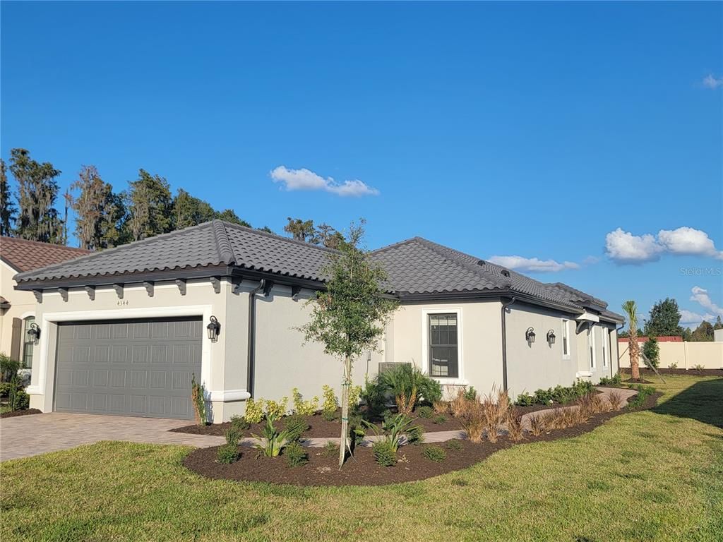 Photo of 4344 CAIROLI COURT, WESLEY CHAPEL, FL 33543 (MLS # J954359)