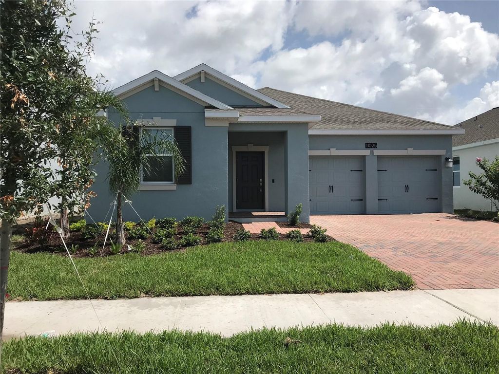 Photo of 11025 Sweetgum Woods Drive, Orlando, FL 32832 (MLS # O6427659)