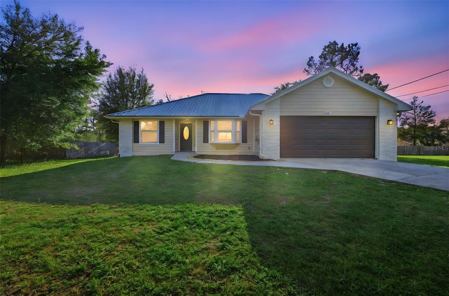 One or more photo(s) has been virtually staged. This beautifully renovated home sits on a spacious one-third acre lot and features stylish, modern updates throughout. The interior boasts durable luxury plank vinyl (LPV) flooring that flows seamlessly from room to room, creating a clean and cohesive look. The brand-new kitchen is designed to impress with  shaker cabinets featuring soft-close doors and drawers, elegant quartz countertops, and sleek stainless steel appliances—perfect for both everyday living and entertaining.

The living room offers an inviting and open feel with high ceilings and a cozy wood-burning fireplace, creating a perfect focal point for gatherings. Both bathrooms have been fully updated with new vanities, toilets, and beautifully finished showers, providing a fresh and contemporary touch.

Situated on a generous one-third acre lot, the property offers plenty of outdoor space for relaxing, gardening, or entertaining while still enjoying the comfort of a completely updated home.