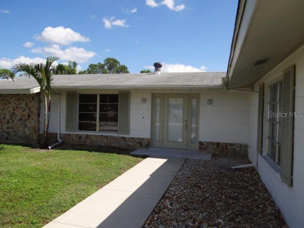 Photo of 3250 Sunrise Trail, Port Charlotte, FL 33952 (MLS # C7509703)