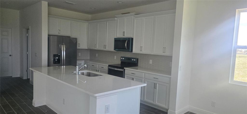 Photo of 14599 Crestavista Drive, Clermont, FL 34714 (MLS # O6298604)