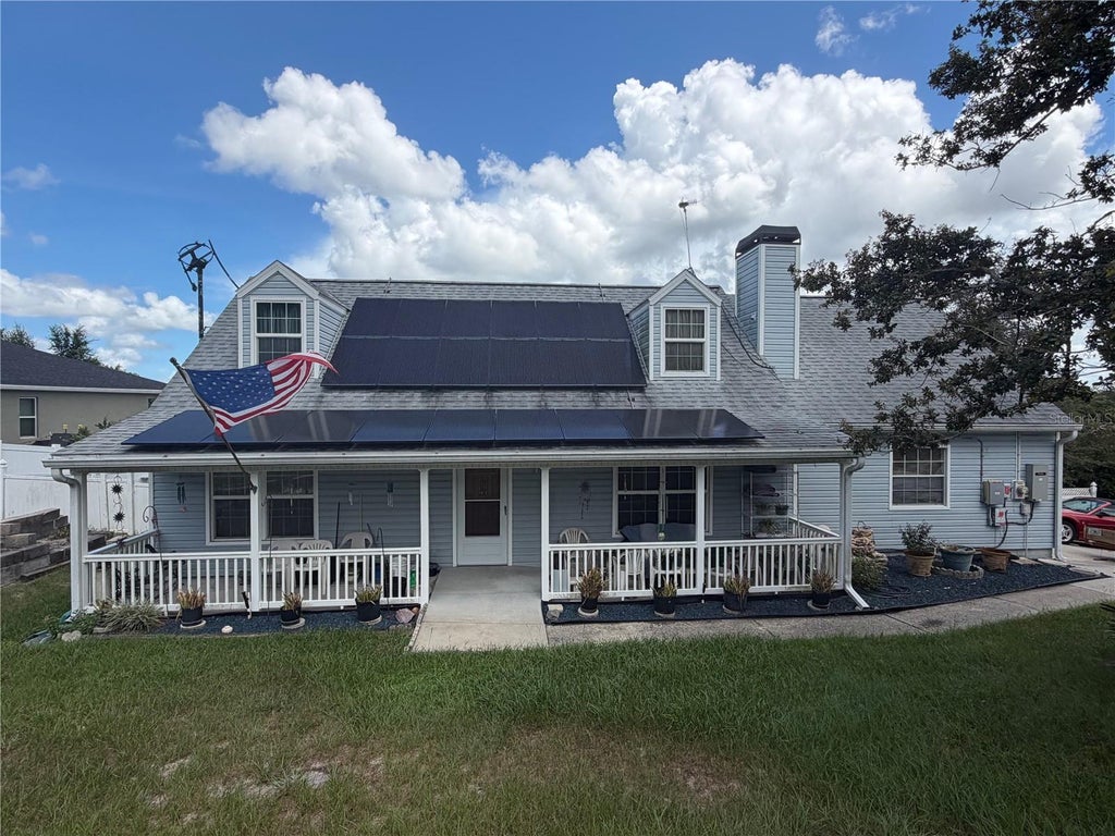 Photo of 1830 Springwood Lane, Deltona, FL 32725 (MLS # O6447861)