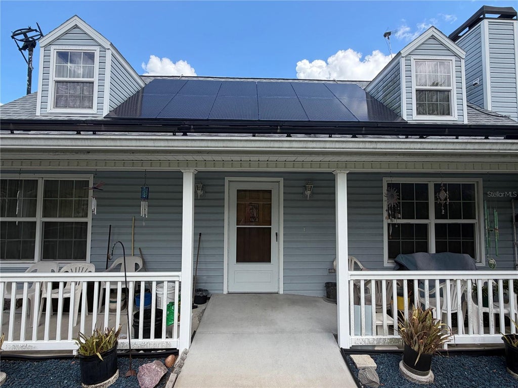 Photo of 1830 Springwood Lane, Deltona, FL 32725 (MLS # O6447861)