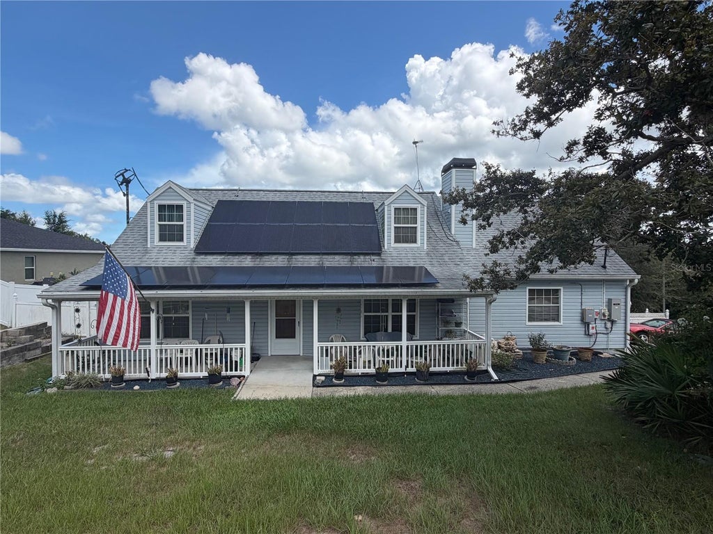 Photo of 1830 Springwood Lane, Deltona, FL 32725 (MLS # O6447861)