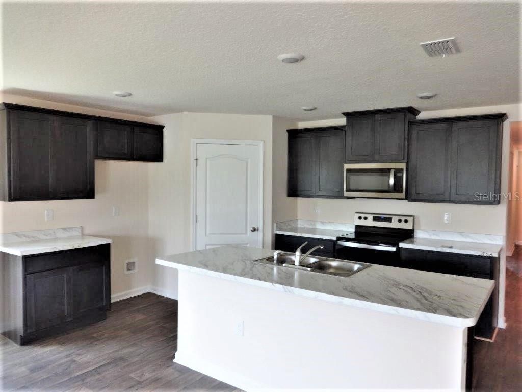 Photo of 24 SUMMERWOOD ROAD S, PALM COAST, FL 32137 (MLS # FC291214)