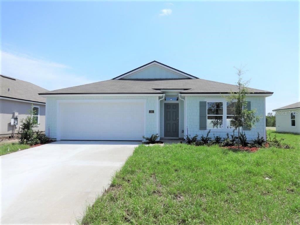 Photo of 24 SUMMERWOOD ROAD S, PALM COAST, FL 32137 (MLS # FC291214)