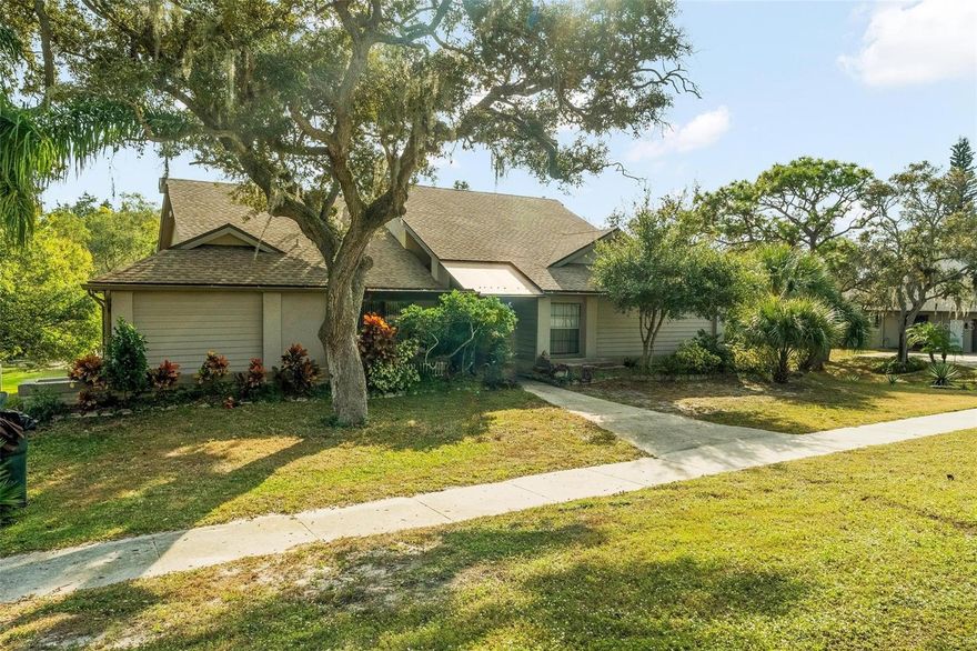 Just minutes from the award-winning Caladesi and Honeymoon Island State Parks, this former Ruttenberg model home for the Waybridge
Subdivision offers a combination of space, privacy, and coastal living. With slightly over 3,600 sq ft of living space, this thoughtfully designed 4-bedroom, 3 full bathroom split-floor plan, including a true walk-out basement, a unique feature in this area, makes it perfect for a growing family or multigenerational living. The main level features a spacious living room, a formal dining room, and a generously sized kitchen equipped with a center island cooktop, stainless steel built-in appliances, and an eat-in breakfast area. The primary bedroom plus the 2nd guest bedroom both have en-suite bathrooms. Sliding glass doors from the living room, primary bedroom, and kitchen open onto an extensive covered deck that overlooks the large private back yard and Curlew Creek, which flows directly into the Gulf, ideal for paddleboarding, kayaking, and enjoying serene water views. Downstairs, the large walk-out basement provides endless possibilities. Use it as an additional living space, convert it back into a 2-car garage, or design the bonus area to suit your lifestyle. Recent big-ticket updates include the roof (2025) and air conditioning (2022). For additional peace of mind, the home is equipped with a whole-home GENERAC generator ensuring uninterrupted comfort during unexpected power outages.