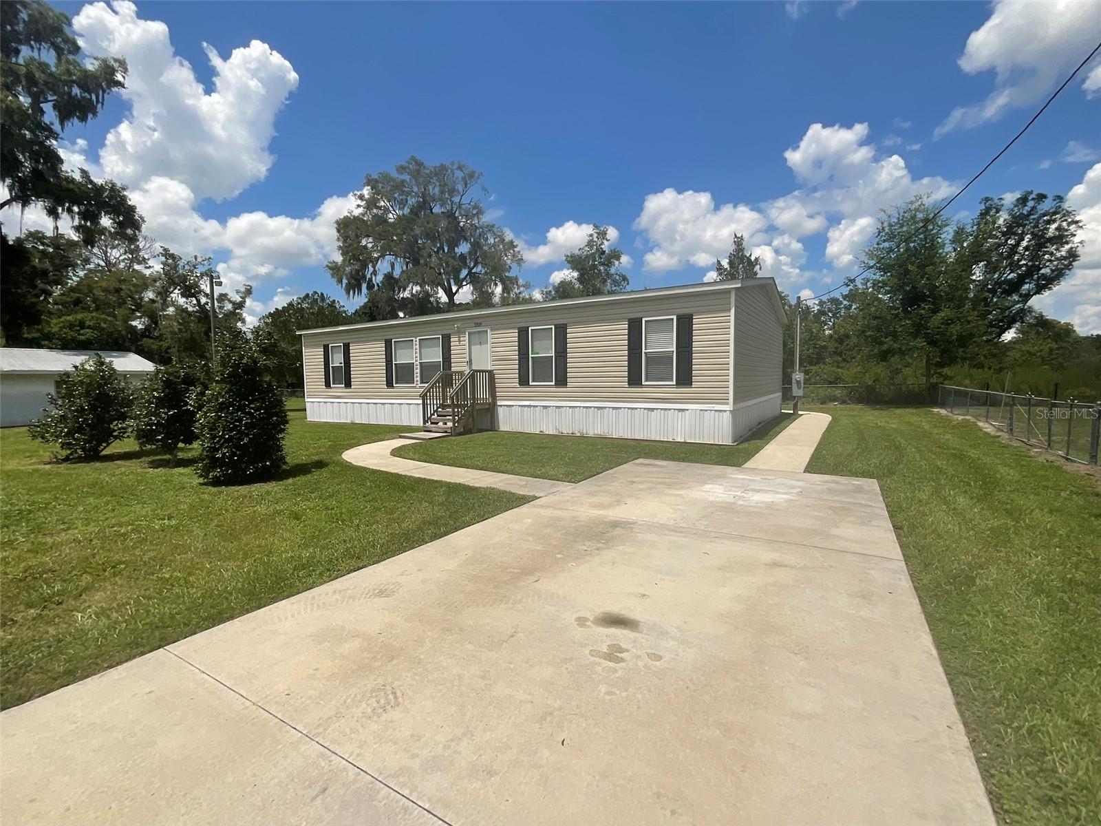 Attention Investors or Buyers wanting a home with rental income – Located just 7 miles from WEC (World Equestrian Center). This is your opportunity to purchase two mobile homes with an additional lot for a total of .81 +/- acres located in desirable NW Ocala. Residence one is 3 3-bedroom, 2-bath mobile home built in 2021 with 1,560 SF +/- of living area. The second residence is a 3-bedroom, 2-bath mobile home built in 1972 with 1,344 +/- SF of living area. The additional storage building on the extra lot is 676 +/- SF.
Property can also be purchased in the following manner:
Residence one and .53 /- acres - $99,500 or Residence two and .28 +/- Acres - $30,000.
See MLS number: OM707973 and OM707980
\Call today for additional information.
