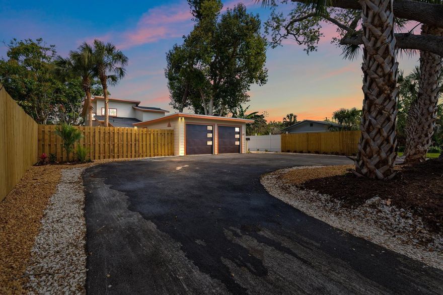 Extensively upgraded, design-forward home across from the water with park views, modern finishes, and seamless indoor-outdoor living. Welcome to a beautifully reimagined St. Petersburg residence located directly across from Forest Bluff Park with peekaboo views of the bay. Thoughtfully updated throughout, this home offers the rare combination of high-end finishes, major system improvements, and future outdoor potential in one of the area’s most peaceful and well-kept neighborhoods. This is far more than a typical renovation. The home features all-new Hardie board siding with new underlying plywood, a brand-new roof, new impact-rated windows and doors, new garage doors, and a brand-new asphalt driveway, offering elevated curb appeal along with meaningful structural and exterior upgrades. Inside, the home delivers a clean, modern aesthetic with a completely remodeled kitchen and bathrooms featuring quartz countertops, soft-close cabinetry, modern brass hardware, and curated lighting throughout. A full suite of new stainless steel appliances enhances both functionality and style. The open-concept layout is anchored by a striking feature staircase with modern cable railing, adding architectural interest and a true custom feel. Designed for the way people want to live, the main living space showcases a stunning accordion-style door system that opens seamlessly to the backyard—creating an effortless indoor-outdoor flow and filling the home with natural light. Upstairs, the private primary suite offers a peaceful escape with its own balcony—perfect for enjoying quiet mornings and beautiful sunrises. The outdoor space has been intentionally left open, giving the next owner the opportunity to design a custom backyard retreat. Pool renderings are available and have been thoughtfully designed in conjunction with a recent survey to align with setback requirements. Preliminary pool quotes are available, and a contractor is ready to begin installation for the new owner. (Renderings are for illustrative purposes only; Buyer to verify all feasibility and permitting.) Located just minutes from downtown St. Petersburg, award-winning Gulf beaches, and nearby boat ramps, including Maximo Park Boat Ramp and Grandview Park Boat Ramp, this home offers the perfect balance of quiet residential living and access to everything that makes St. Pete so desirable. Homes with this level of finish, flexibility, and location are rare—schedule your private showing and experience it in person.