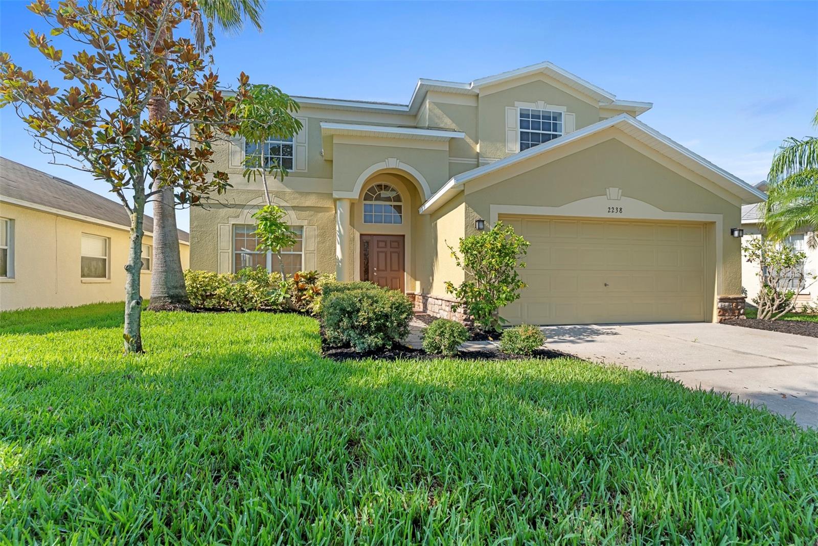 One or more photo(s) has been virtually staged. **More Space. More Freedom. More Florida.** Thoughtful updates meet everyday practicality in Ruskin’s best-kept secret: River Bend. A brand-new roof, fresh exterior paint, new LVP flooring, refinished stairs, and new sod mean you move in ready to relax, not renovate. The kitchen is spacious and smartly designed with granite counters, 42-inch cabinets, an island, and a breakfast nook overlooking serene pond views. Triple sliders open to a covered patio with no rear neighbors, just quiet mornings and the occasional heron. River Bend gives you resort-style perks without the price tag: fitness center, oversized pool, playgrounds, pickleball, and basketball courts, and a fenced dog park. Commuting is easy with quick access to I-75 and US-41, putting Tampa, MacDill, beaches, shopping, dining, hospitals, and EG Simmons Park within reach. Low HOA fees. High lifestyle value.