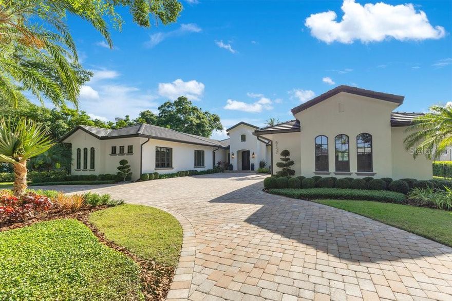 Fully rebuilt and expanded in 2019, this rare single-story golf-front estate offers sun-filled living and panoramic views of Hole 4. Designed for refined luxury and effortless entertaining, the residence spans 5,721 square feet of interior living space (approximately 7,330 square feet total) on a professionally landscaped 0.51-acre lot.

The open, light-filled floor plan includes six bedrooms, eight and a half baths, a private executive office, and a dedicated gym. Highlights include a chef’s kitchen with Sub-Zero and Wolf appliances, updated plumbing and electrical systems, smart-home prewiring, heated resort-style pool, epoxy-finished three-car garage, and numerous modern upgrades throughout.

Set within one of Florida’s most exclusive private golf communities, residents enjoy championship golf, access to the Butler Chain of Lakes, luxury fitness and dining, curated social events, and 24-hour guarded security.

Move-in ready and thoughtfully reimagined, this estate offers a rare combination of single-story living, golf-front views, and elevated lifestyle appeal for the most discerning buyer.
