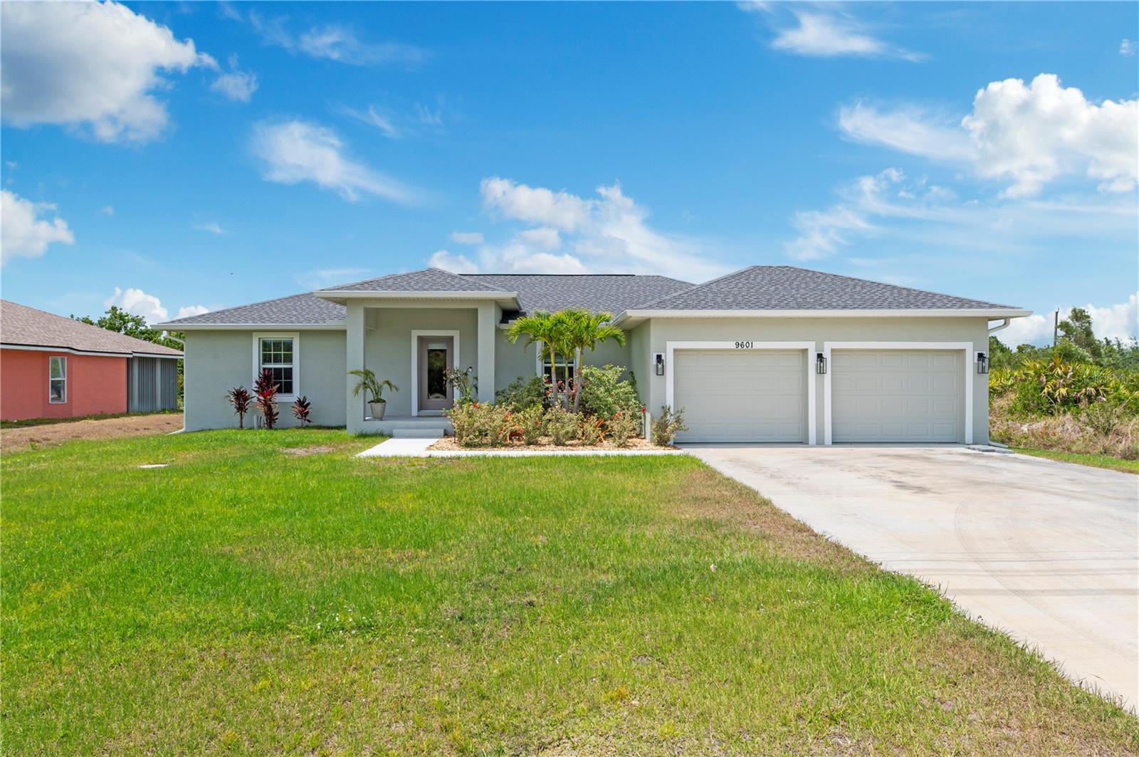 Available for annual rental. Welcome to this like-new (built 2023), move-in ready, 3 bed 2 bath home nestled in the sought-after South Gulf Cove community! This open-concept residence features beautiful wood-look tile flooring throughout, creating a seamless and stylish look. The kitchen boasts a large island, granite countertops, and soft-close wood cabinetry—perfect for cooking and entertaining. French doors open to a screened lanai, ideal for relaxing or enjoying Florida’s beautiful weather. The spacious primary en suite features dual sinks and a generous walk-in closet. Additional highlights include a convenient laundry room with a utility sink, and an OVERSIZED 2-car garage with EPOXY FLOORS and shelving for extra storage, screened in lanai, fixtures, blinds and an EXTENDED DRIVEWAY for overflow parking. Explore nearby parks and preserves, and take advantage of the area’s renowned fishing, boating, and golf opportunities. Just minutes from Boca Grande, Englewood, and Manasota Key Beaches! Application fee 75 per adult. First last and security. Pets with owner approval.