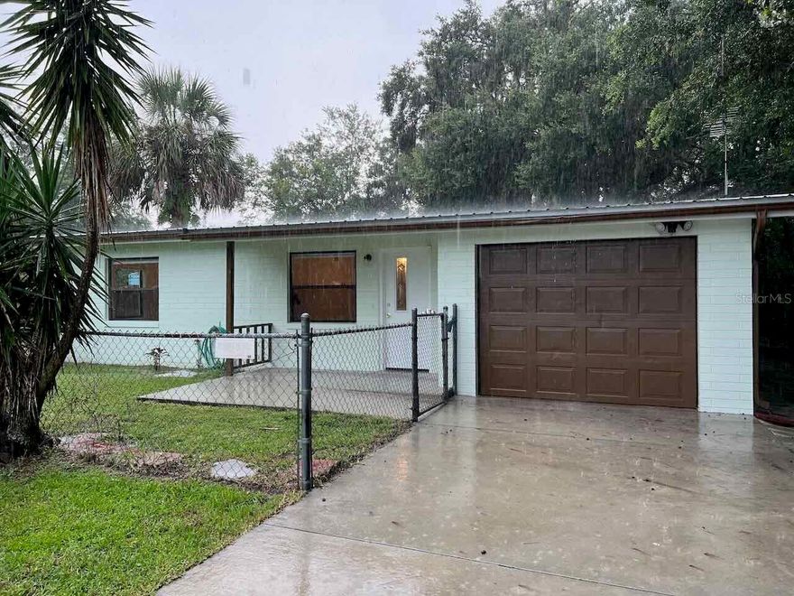 Opportunity! Wonderful Home ideally located at the end of Lake Drive in New Smyrna.  This quaint renovated home is within walking distance to The Publix Shopping Center, restaurants and shops.  The main home is 2 Bedroom 1 Bath/1 car garage with a combination Living Room/Dining Room and then a separate Family Room just off the kitchen with a door that opens to a courtyard and walkway to the back 1 Bedroom/1 Bath guest home.  A perfect home with guest home at an affordable price!  Upon entering onto the enclosed front patio, an inviting lighted door opens to glossy terrazzo floors and a bright open floor plan with views through the big window all the way through to the back yard.  There is a laundry doom with easy access just off the family room and kitchen.  A wooded buffer offers privacy.  Easy to view ;Water: City