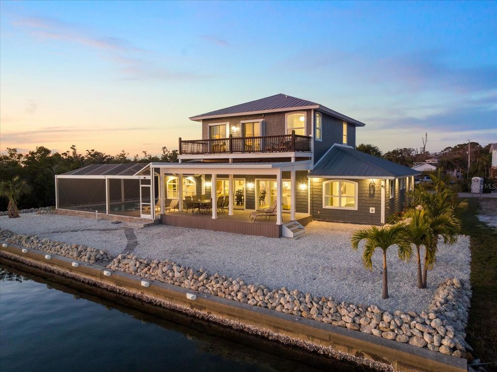 Photo of 949 Suncrest Lane, Englewood, FL 34223 (MLS # N6142715)