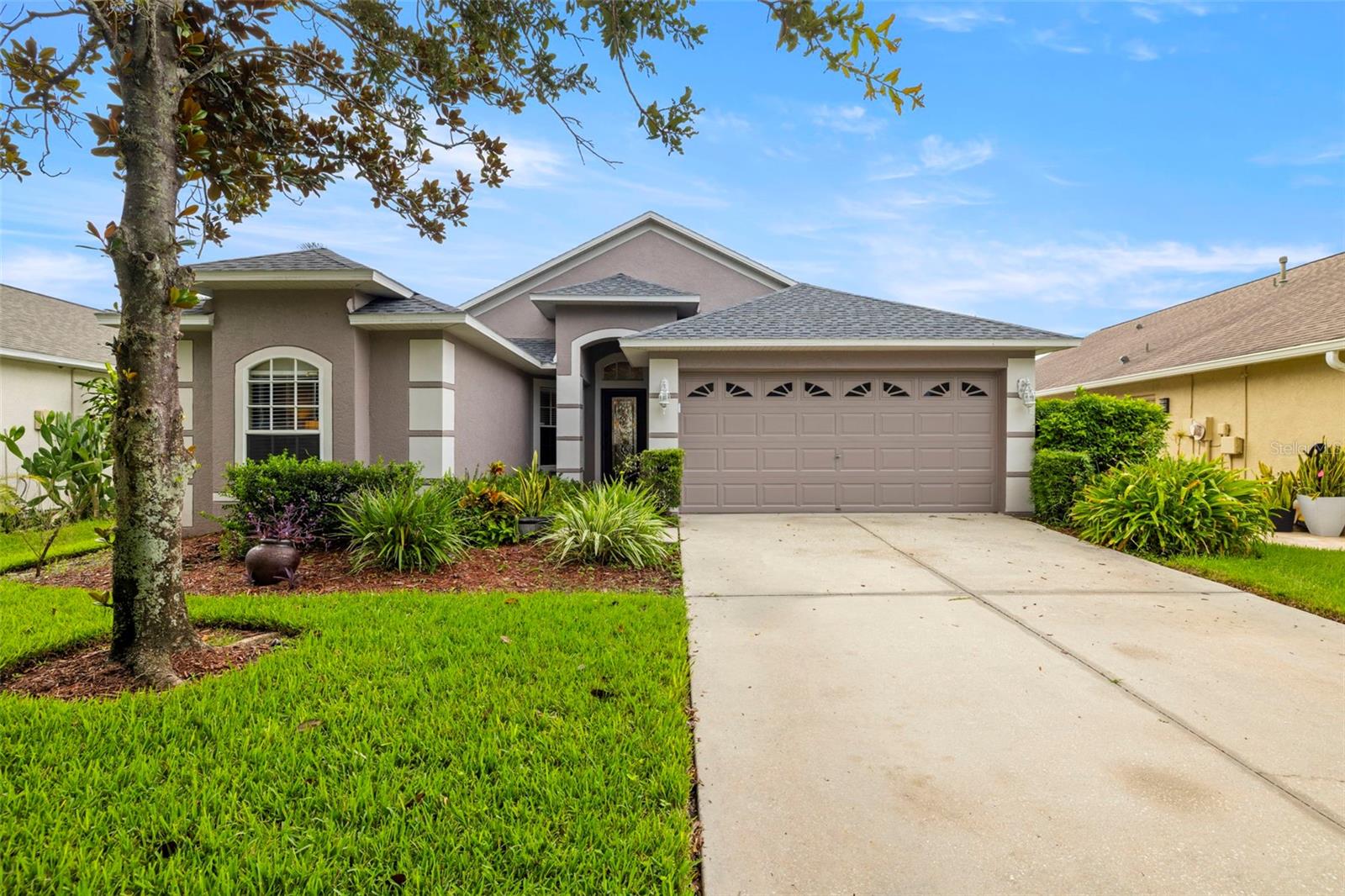 Welcome to your Florida dream home in a desirable gated community. This beautifully maintained 3-bedroom + office, 2-bathroom pool home offers the perfect blend of comfort, style, and convenience. Step inside to an inviting open floorplan with vaulted ceilings and abundant natural light. You'll love the no-carpet interior, making maintenance a breeze and giving the home a sleek, modern feel. The split floorplan ensures privacy, while the massive primary suite provides a true retreat with plenty of space to relax. Enjoy year-round outdoor living with your own private pool and brick pavered patio, ideal for entertaining or unwinding in your fenced backyard oasis. Major updates include a newer roof (2024) and fresh exterior paint (2023). Additional features include a water softener system, sprinkler system, and a dedicated home office/den - perfect for remote work or a quiet study space. Don't miss this opportunity to own a stunning pool home in a secure, well-maintained community 5 minutes to the Brandon Mall and movie theatre, and 20 minutes to downtown Tampa!