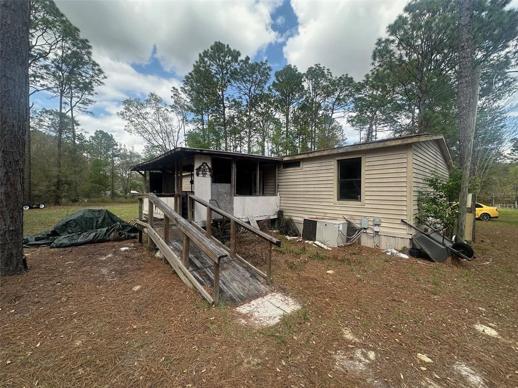 Photo of 3700 SW 189th Avenue, Dunnellon, FL 34432 (MLS # OM721546)