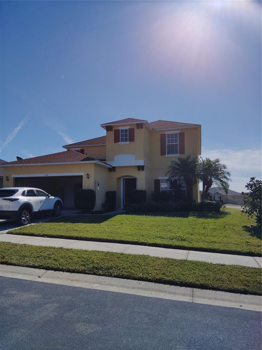 Great two story, starter home, for a first time home buyer nestled in a quiet, family friendly neighborhood.  This home has lots of space. The Master Bedroom is downstairs with 3 large bedrooms upstairs along with a Bonus room with a walk in closet.  This home is located minutes to Interstate 4, shopping, restaurants, and close to Walt Disney World.  Seller is very motivated to sell you this home.