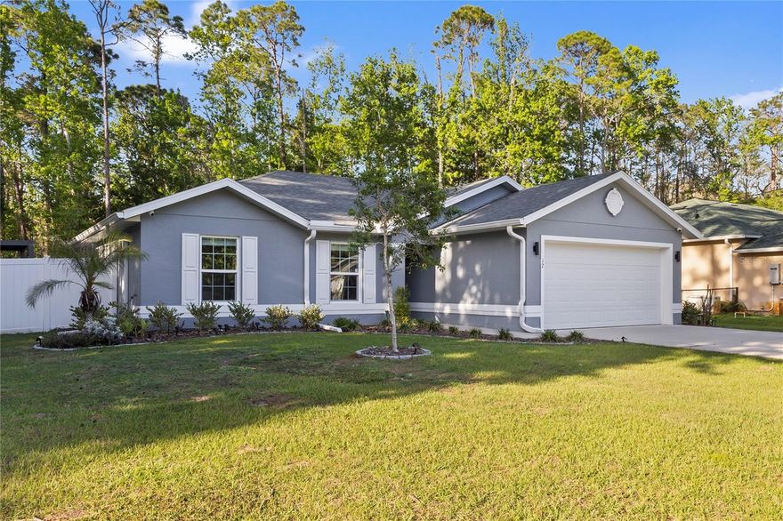 Welcome to this beautifully done 3-bedroom, 2-bath home in Seminole Woods! Situated on an oversized lot in a prime Palm Coast location, enjoy some extra space! 

Designed for both comfort and convenience, this home features tile flooring throughout the main living areas, creating a clean feel with easy maintenance. The kitchen is equipped with sleek stainless steel appliances and plenty of cabinet/counter space, perfect for everyday living. Smart home switches throughout the property add a layer of modern efficiency, while the built-in surround sound system enhances your listening experience. For added peace of mind, the home also includes a full surveillance system.

Step outside to enjoy a fully fenced and private backyard. The paver patio and covered outdoor area create the perfect setting for relaxing or hosting gatherings year-round.

Ideally located with easy access to the heart of Palm Coast, Flagler Beach, and Ormond Beach, this home offers the perfect blend of lifestyle and location. With minimal driving you will easily find restaurants, shopping, entertainment, hospitals, nature parks, and more. Come see your dream home!