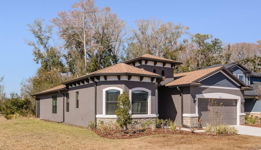 Photo of 11347 Weaver Hollow Road, New Port Richey, FL 34654 (MLS # TB8473592)