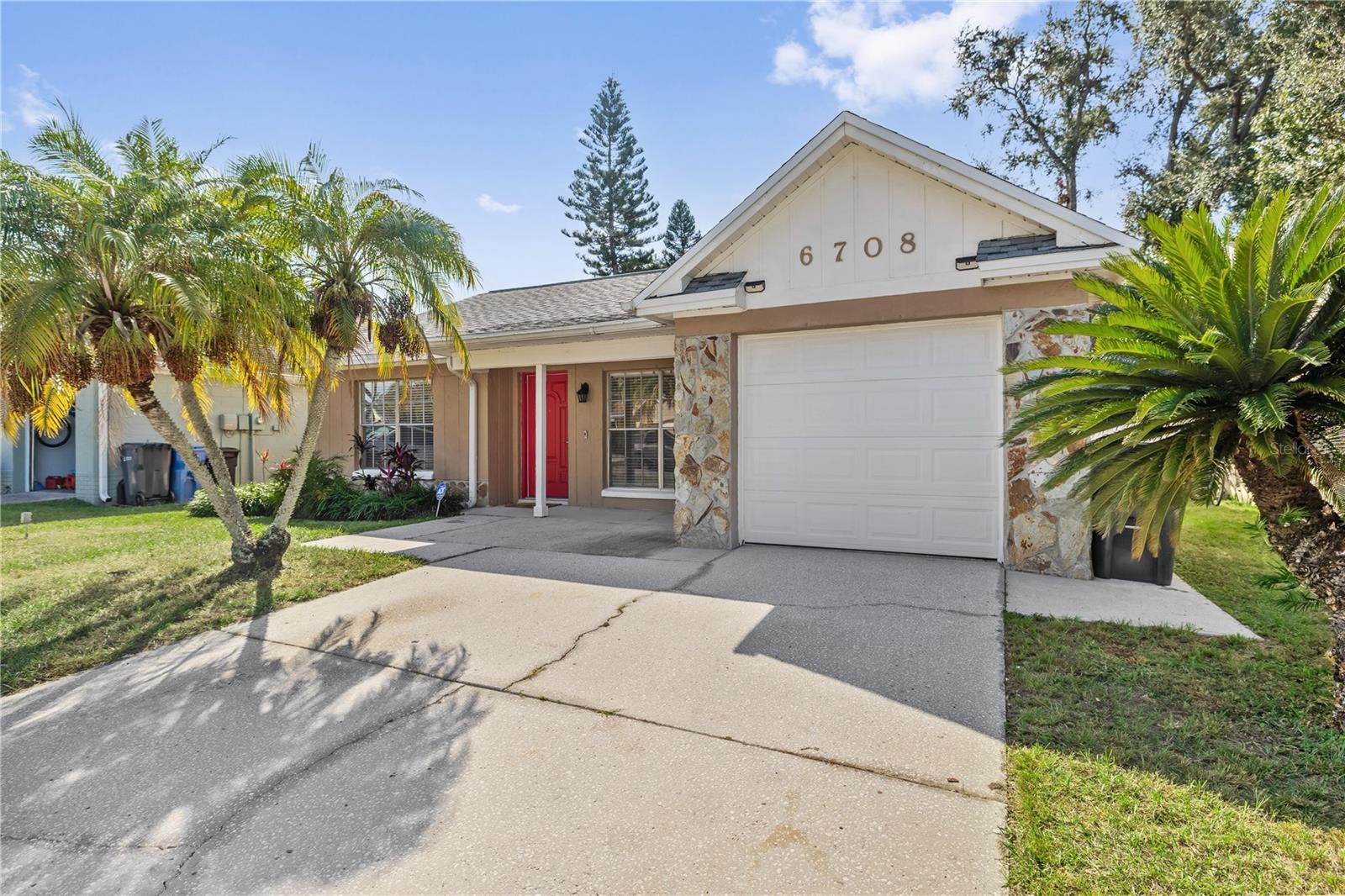 This charming 3-bedroom, 2-bathroom home is a must-see, featuring an inviting open layout, beautifully updated interior, and a host of thoughtful upgrades throughout.
Inside, you'll find a freshly painted interior and elegant LVP flooring, complemented by sparkling stainless steel kitchen appliances installed this year. The backyard has been resodded and includes a firepit and new concrete patio—perfect for entertaining or relaxing evenings. Recent 2025 updates include a new roof, front door, and sliding glass door, while the shed and vinyl backyard fence, added in 2024, provide storage and added privacy.
Additional highlights include a professionally installed custom closet system in the master suite and one guest room, as well as an EV charger ready for your electric vehicle. The owners have also thoughtfully maintained the home with annual termite treatments (2018–2025) and quarterly pest control, ensuring peace of mind for years to come.
Ideally located near the airport, shopping, restaurants, top-rated schools, and major highways including Veterans Memorial and I-275, this home perfectly blends comfort, style, and convenience.  Schedule a showing today!