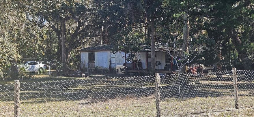 Situated on 2 acres of land on a quiet dirt road with two entrances, this 1,200 sq ft mobile home offers privacy, space, and a peaceful rural setting. Located in a highly populated deer area and backing up to expansive, undisturbed power line property, the home provides both wildlife enjoyment and long-term privacy with no rear neighbors.
The interior has been converted to an open floor plan, featuring a new subfloor and new laminate flooring, with approximately 300 square feet of matching laminate still new in the box for future use. A dedicated laundry room adds convenience for everyday living.
The home is equipped with two water softeners, a 600-pound propane tank supporting all gas appliances, including a tankless water heater, and all appliances and the gas grill convey with the sale, providing move-in-ready functionality. An RV hookup further enhances flexibility for travel, guests, or storage.
The property includes three large sheds with electricity—one in excellent condition and the others offering additional space and in need of some TLC. The roof of the main home has minor repairs completed and would benefit from routine maintenance, giving the next owner an opportunity to maintain and enhance long-term value.
With significant upgrades, usable outbuildings, dual access, abundant wildlife, and serene rural surroundings, this property presents a rare opportunity for buyers seeking space, functionality, and potential in a quiet country setting.