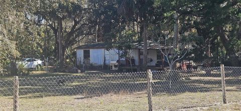 Photo of 11159 N Clamdigger Terrace, Inglis, FL 34449 (MLS # OM717762)