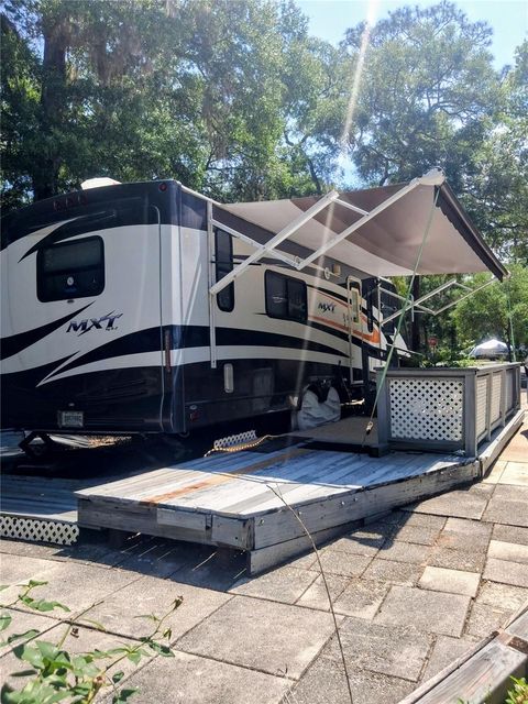 Photo of 25225 141st Lane NE, Fort Mccoy, FL 32134 (MLS # O6406557)