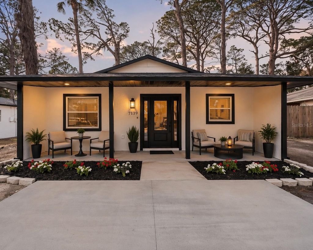 Photo of 7139 Pinewood Drive, New Port Richey, FL 34652 (MLS # TB8477591)