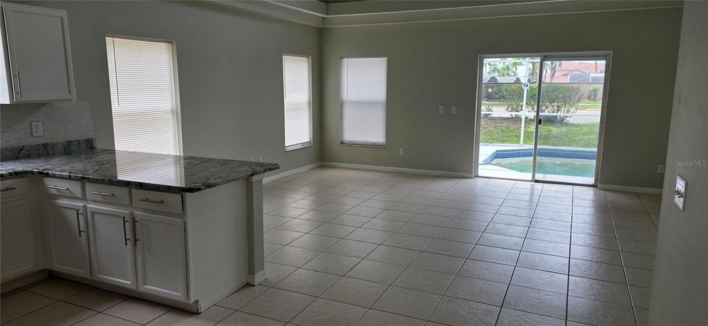 Photo of 103 Riggs Circle, Davenport, FL 33897 (MLS # O6428437)