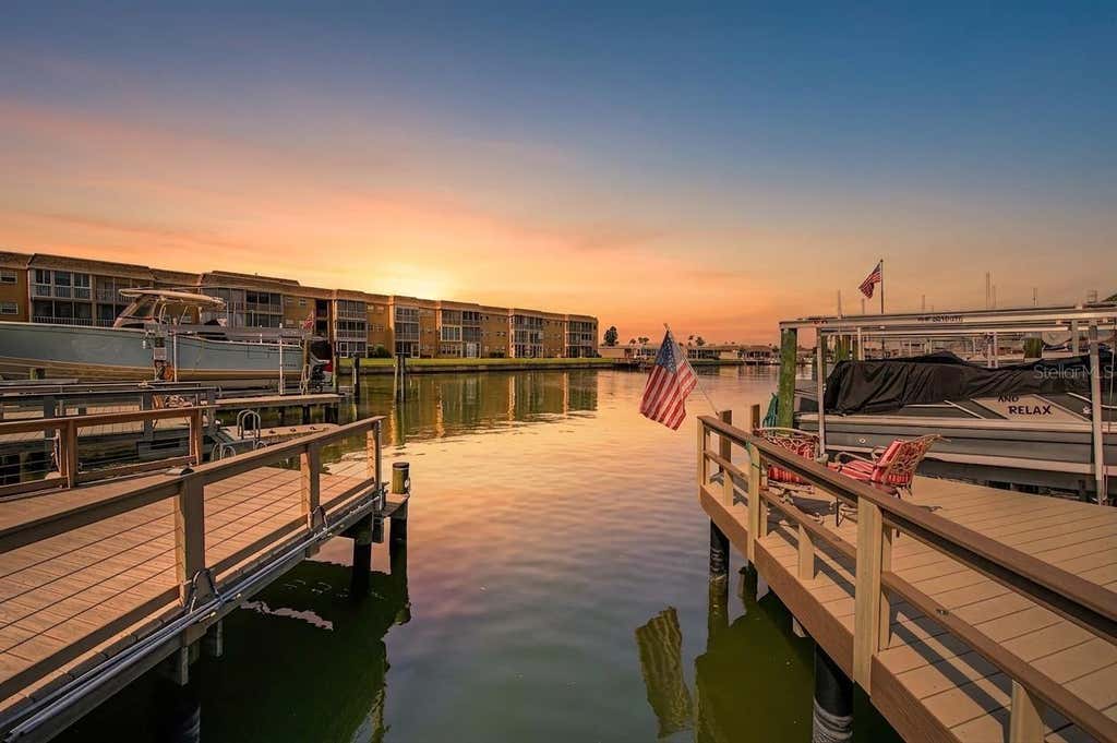 Photo of 144 Boca Ciega Point Boulevard N, St Petersburg, FL 33708 (MLS # TB8512356)