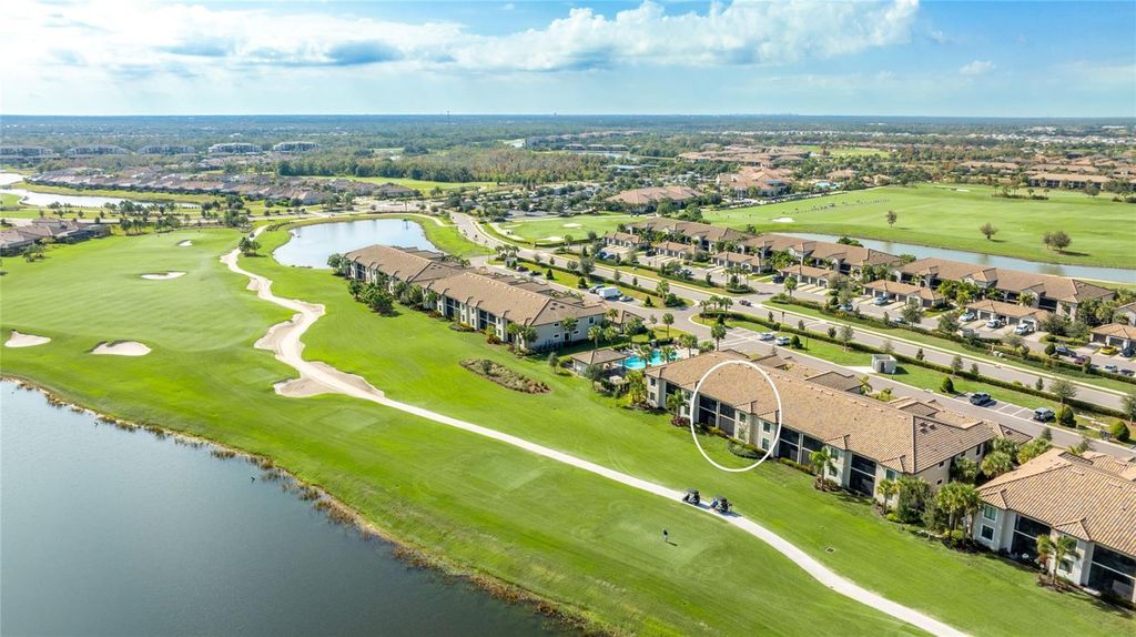 Photo of 5695 Palmer Circle #105, Bradenton, FL 34211 (MLS # A4676378)