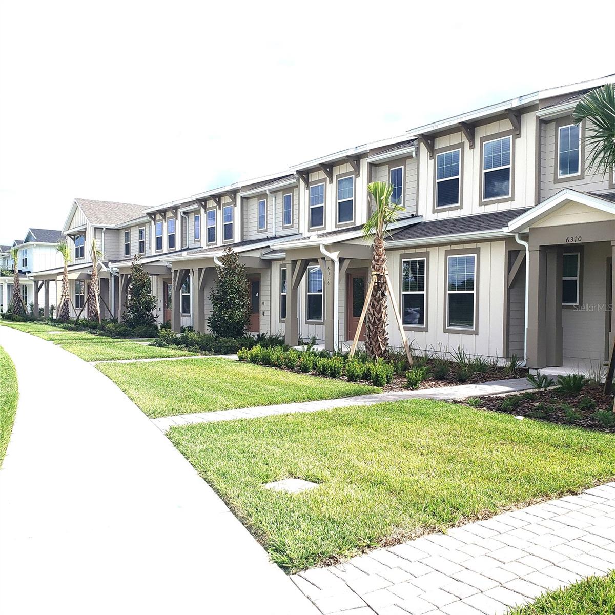 Be the first to live in this beautifully crafted brand new 3-bedroom, 2.5 bath townhome, with a pond view, located in the heart of Winter Garden, in SILVERLEAF OAKS. Just a short distance from Disney World, this home offers the perfect blend of modern comfort, convenience, and Florida charm. Step inside to discover an open-concept floor plan with stylish finishes, including luxury vinyl plank flooring, quartz countertops, stainless steel appliances, and a spacious kitchen island--perfect for entertaining. The primary suite features a large walk-in closet and a spa-inspired bathroom with dual sinks and a glass-enclosed shower. Enjoy the convenience of a 2-car garage, in-unit washer and dryer, and smart home features throughout. Outside, take in the peaceful community setting with expansive green spaces and pond. ZONED TO TOP-RATED SCHOOLS. Located just off Tollroad 429, and just a few short minutes from Orlando Health Hospital, Orlando College of Osteopathic Medicine, Shopping Street 192, numerous stores, restaurants, and entertainment in Hamlin Town Shopping Center, Orange County National Golf Center, Winter Garden Village, Flamingo Crossings Village (owned by Disney), and much more. The elementary and middle schools are walking distance from the home! RESERVE YOUR SHOWING TODAY!