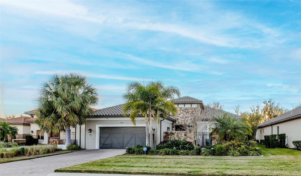 Photo of 9913 Wicker Park Place, Palmetto, FL 34221 (MLS # A4677538)