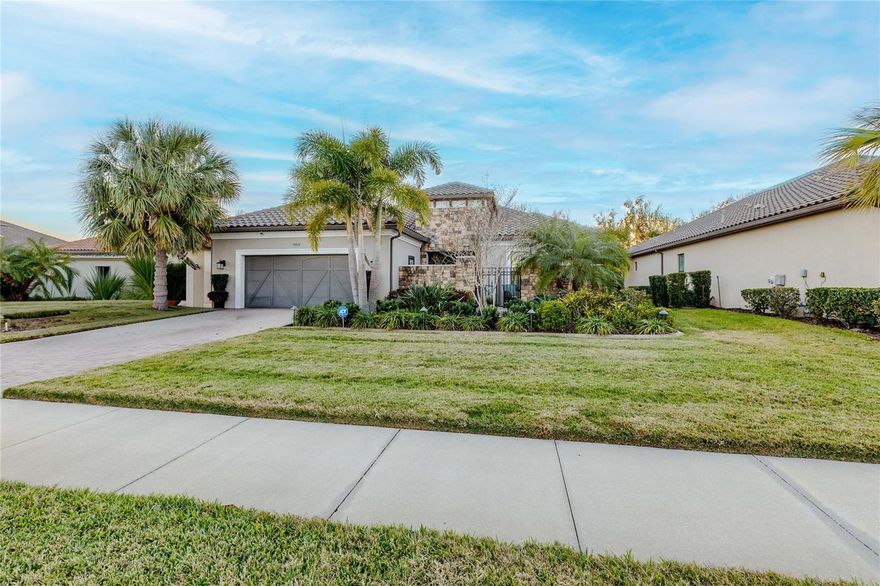 Florida Living at Its Finest: A Pallazio Estate That Redefines Luxury! Ever imagined a home where resort-style amenities, cutting-edge systems, and stunning design come together flawlessly? This Pallazio estate by Taylor Morrison, privately situated on a cul-de-sac with an oversized homesite in Artisan Lakes Esplanade, delivers exactly that- and more. Inside, every detail has been thoughtfully curated. Coffered and tray ceilings with accent beams, crown molding, plantation shutters, and custom closets throughout create a timeless, modern aesthetic. The renovated kitchen (2025) boasts refined cabinetry, premium finishes, and a clean palette, perfect for elegant entertaining or everyday living. Custom office cabinets, installed fans, and a whole-home sound system ensure comfort, convenience, and style throughout. State-of-the-art systems keep you secure and comfortable year-round: ADT security and cameras, whole-house generator, 5-ton 19 SEER Rheem heat pump A/C (2025), hurricane-impact windows, hurricane screens in the lanai, whole-house water softener, and a pest defense system. Every upgrade has been intentionally selected to support peace of mind and effortless living. The 2-car garage featuring tandem parking is a showpiece with epoxy flooring, 44' of racking- perfect for luxury vehicles, storage, or a personal workspace. Step outside to your private Florida retreat. The Pebble Tec pool with a heat pump, cedar wood lanai ceiling, and professionally installed landscape and pool cage lighting set the stage for breathtaking evenings. Entertain in the high-end summer kitchen with premium appliances and custom cabinetry, or enjoy the installed outdoor speakers while soaking in your resort-style oasis. Every element of this outdoor space- from lighting to finishes- was carefully crafted for entertainment, relaxation, and style. Additional premium upgrades include: accent beams in the main living area and primary bedroom, plantation shutters, custom closets, interior and exterior painting (2022), installed gutters, new interior light fixtures, whole-house generator, and more- ensuring this home is truly turnkey. Living in Artisan Lakes Esplanade means enjoying two private clubhouses, resort-style pools and spas, a fitness center, pickleball courts, scenic walking trails, and a vibrant social calendar, all just minutes from Gulf Coast beaches, dining, and travel corridors. This is more than a home- it's a statement of refined living, privacy, and elevated lifestyle. Every corner, every upgrade, and every detail has been intentionally designed to deliver a home that wows- inside and out. Welcome to your ultimate Florida retreat.