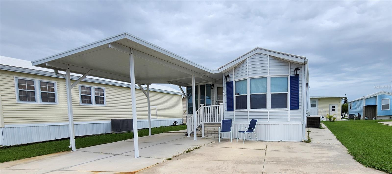 UPDATED TWO BED, TWO BATH MOBILE HOME IN ACTIVE 55+ COMMUNITY! Don't miss out on this charming home located in Sugar Creek Country Club. This Bradenton, Florida property with its beach themed decor is move-in ready! Features include a bright kitchen with Corian countertops and deep sink. The spacious dining room has a window seat and built-in storage. The living room boasts a wall of side-sliding windows with screens to bring in the sunshine and fresh air. Both bedrooms have en suit bathrooms. The first bath has a tub/shower and the second bathroom has a large step-in shower and laundry. The guest room has a separate entrance from the outside. Lovely furnishings, central A/C, membrane roof, awnings, tie-downs, carport, and extra parking space add to the value. The community has LOW HOA FEES of $525 quarterly. Those fees include: water, trash, sewer, cable, internet, and grass mowing. SO MUCH TO OFFER!