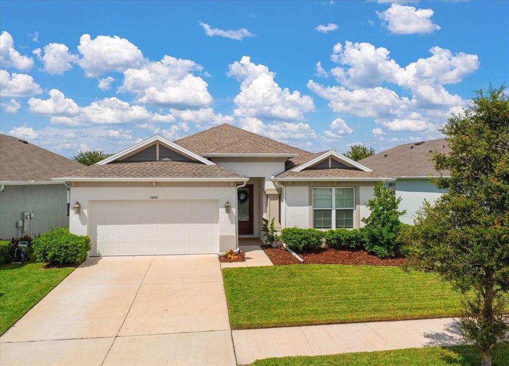Photo of 34181 Radley Way, Wesley Chapel, FL 33545 (MLS # TB8551620)