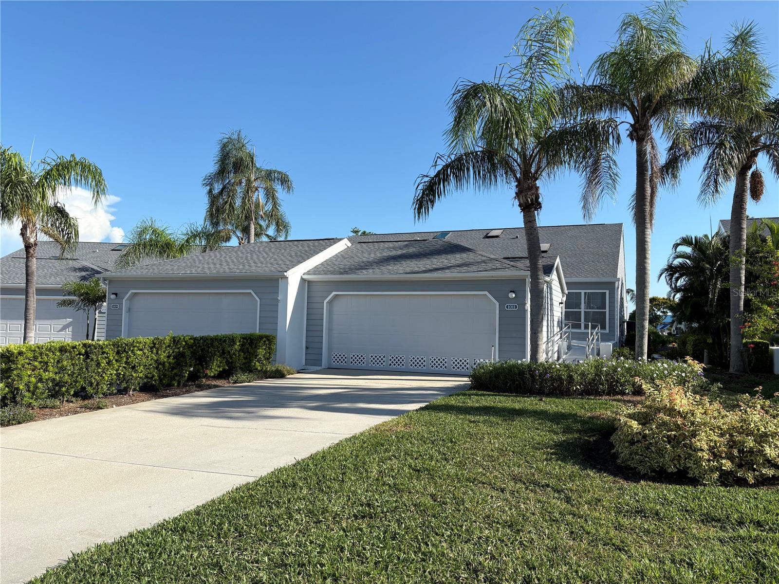Located just over the bridge from the beautiful Gulf beaches of Anna Maria Island, this spacious 2-bedroom, 2-bathroom plus den condo in the desirable Perico Bay Club is available for annual rental—and water, sewer, trash, internet, and cable are all included in the rent! Handicap accessible, this condo features ramp access to the front patio and entryway, along with bamboo and tile flooring throughout. The open-concept layout is light and bright, offering a comfortable living area and formal dining space that opens via sliding glass doors to a large three-season room. From there, step out onto the deck and take in serene lake views and an abundance of birdlife—perfect for relaxing and enjoying the Florida lifestyle. The kitchen is both stylish and functional, featuring wood cabinetry, granite countertops, stainless steel appliances, a pantry, and a cozy breakfast area filled with windows and natural light. The lake-facing primary bedroom includes an en-suite bath with dual sinks, a walk-in shower, and a spacious walk-in closet. A versatile den with pocket doors can serve as a home office or third bedroom, while the guest bedroom and full guest bath with a shower/tub combo provide comfort for visitors. Additional highlights include a washer and dryer and a two-car garage. Perico Bay Club is a gated, resort-style community offering a wealth of amenities, including multiple pools, a clubhouse, fitness center, tennis and pickleball courts, kayak launch, and scenic walking trails through lush mangrove preserves. Whether you're exploring nature, paddling the nearby waterways, or enjoying the vibrant shops and restaurants of Anna Maria Island, this condo offers the perfect blend of comfort, convenience, and coastal charm. All Home Rentals of Manatee residents are enrolled in the Resident Benefits Package (RBP) for $49.95/month which includes renters insurance, credit building to help boost your credit score with timely rent payments, $1M Identity Protection, HVAC air filter delivery (for applicable properties), move-in concierge service making utility connection and home service setup a breeze during your move-in, our best-in-class resident rewards program, and much more! More details upon application.