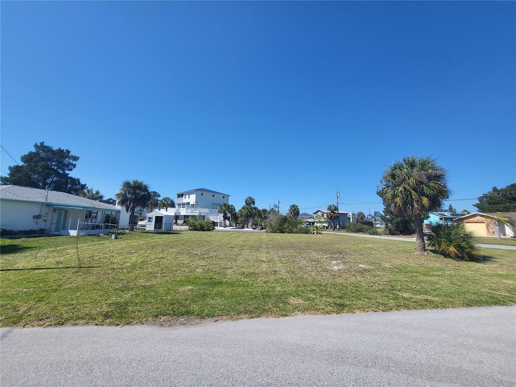 Photo of 3463 Paragon Terrace, Hernando Beach, FL 34607 (MLS # TB8499161)