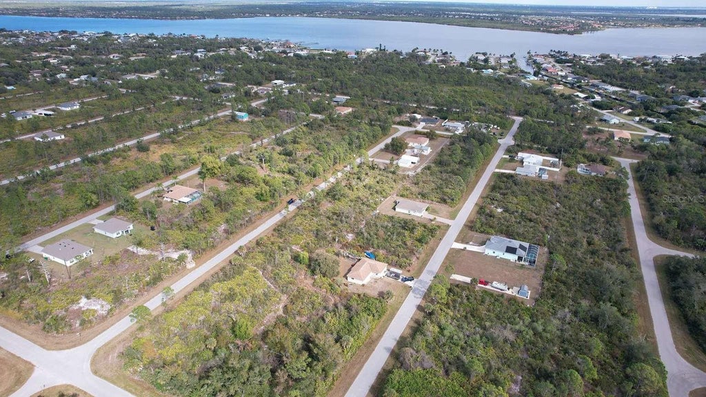 Photo of 12181 Conroy Avenue, Port Charlotte, FL 33981 (MLS # TB8560250)