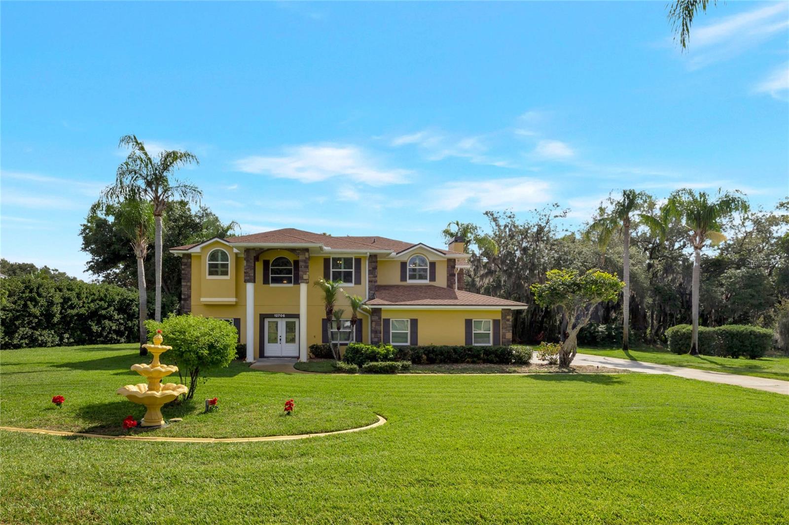 4 Bedroom 3 bathroom Pool Home in a Lakefront, Gated Community with Private Boat Dock, No Water Bill! LAWN MAINTENANCE, POOL SERVICE and HOME WARRANTY INCLUDED.
Experience the best of Florida living in this 4-bedroom, 3-bath custom POOL HOME ON ONE ACRE in exclusive Magnolia Bay — a quiet, gated community of only 40 custom homes, surrounded by lakes and rolling hills in Clermont. This spacious two-story retreat sits on nearly an acre with mature oaks for privacy. Enjoy direct access to Johns Lake from the private community boat dock — perfect for boating, fishing, and water sports. Inside, the bright, open layout features updated double-pane windows (2022), plantation shutters, and beautiful natural light throughout. The main level offers a guest suite with a full bath (also serves as a pool bath), plus open living, dining, and family rooms designed for relaxing and entertaining. Upstairs, the large owner’s suite includes a newly updated spa bathroom with garden tub and shower (2024) and double walk-in closets. Two more bedrooms share a stylish Jack and Jill bath, also updated in 2024. A versatile loft area works great as an office, playroom, or media space.
Outside, your private oasis awaits, unwind on the spacious patio, swim in your sparkling pool and enjoy the peace of wooded surroundings, NO REAR NEIGHBORS. The oversized two-car garage features extra storage and epoxy floors. A long driveway easily fits a boat, and the brand-new well (2025) means NO WATER BILL.
This quiet gated community includes a PRIVATE BOAT DOCK for launching your boat or fishing, playground, pickleball, tennis, and basketball courts for endless recreation. Conveniently close to shopping, Montverde Academy, just minutes to the Turnpike and three miles to the West Orange Trail.