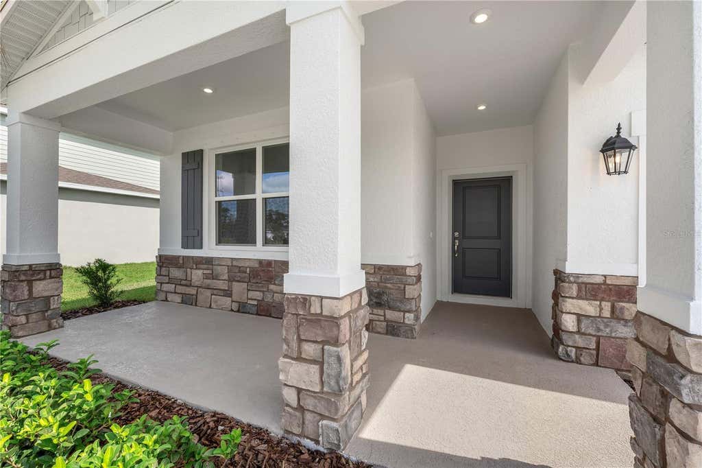 Photo of 9198 Harris Hawk Drive, Leesburg, FL 34788 (MLS # O6436194)